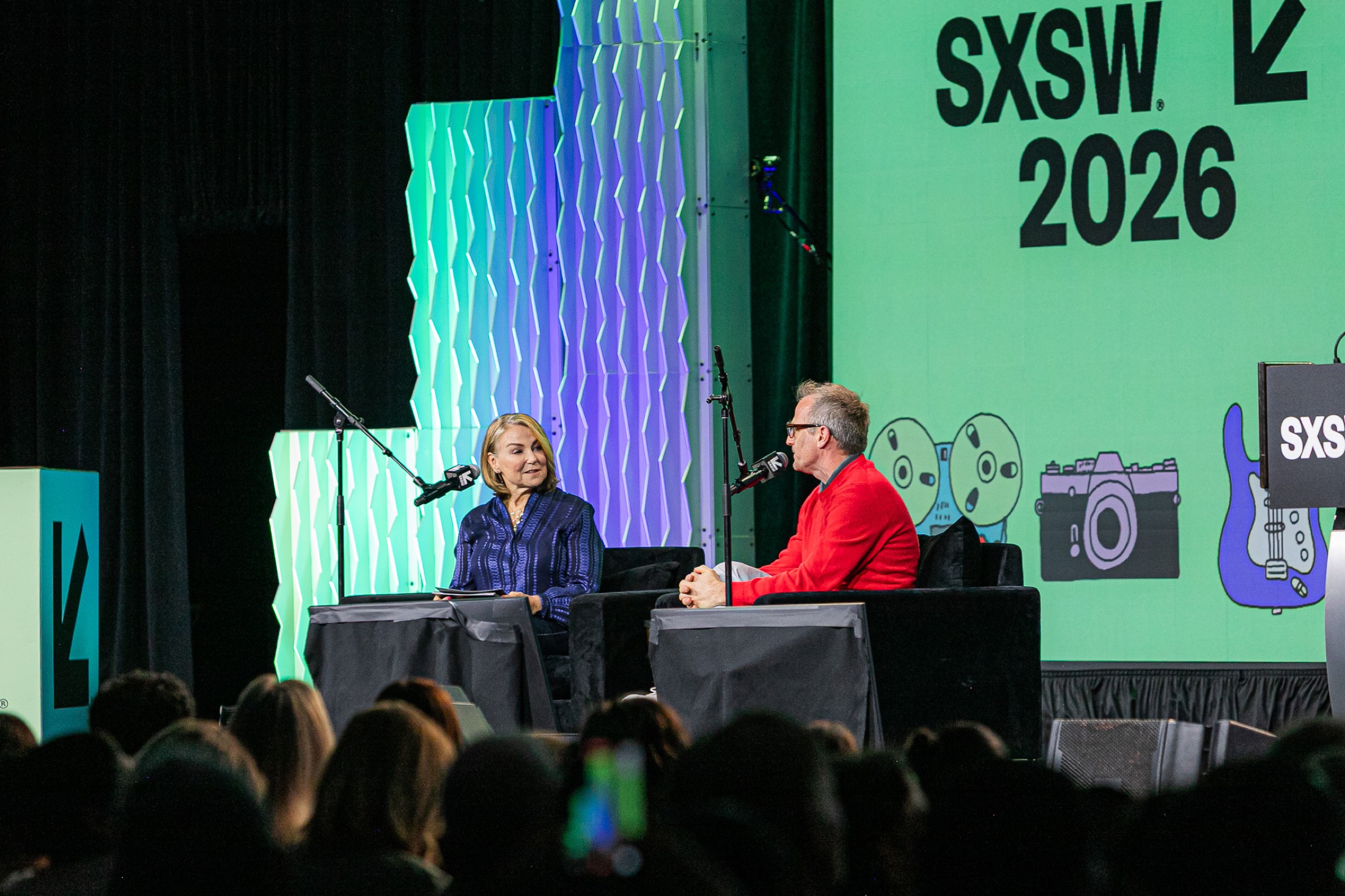 Spike Jonze and Esther Perel speaking on a SXSW 2026 panel about love, loneliness, and AI