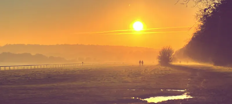 Golden light across Epsom Downs Racecourse