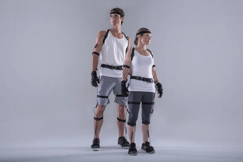 Motion capture performer photographed in a studio environment for performance capture