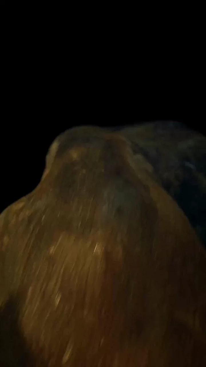 A frame from the film passing close to the painted surface of Saturn’s bent arm